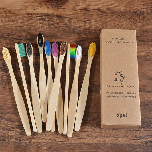 Lot de 10 brosses à dents colorées en bambou naturel, poils souples et charbon, pour une hygiène bucco-dentaire écologique.
